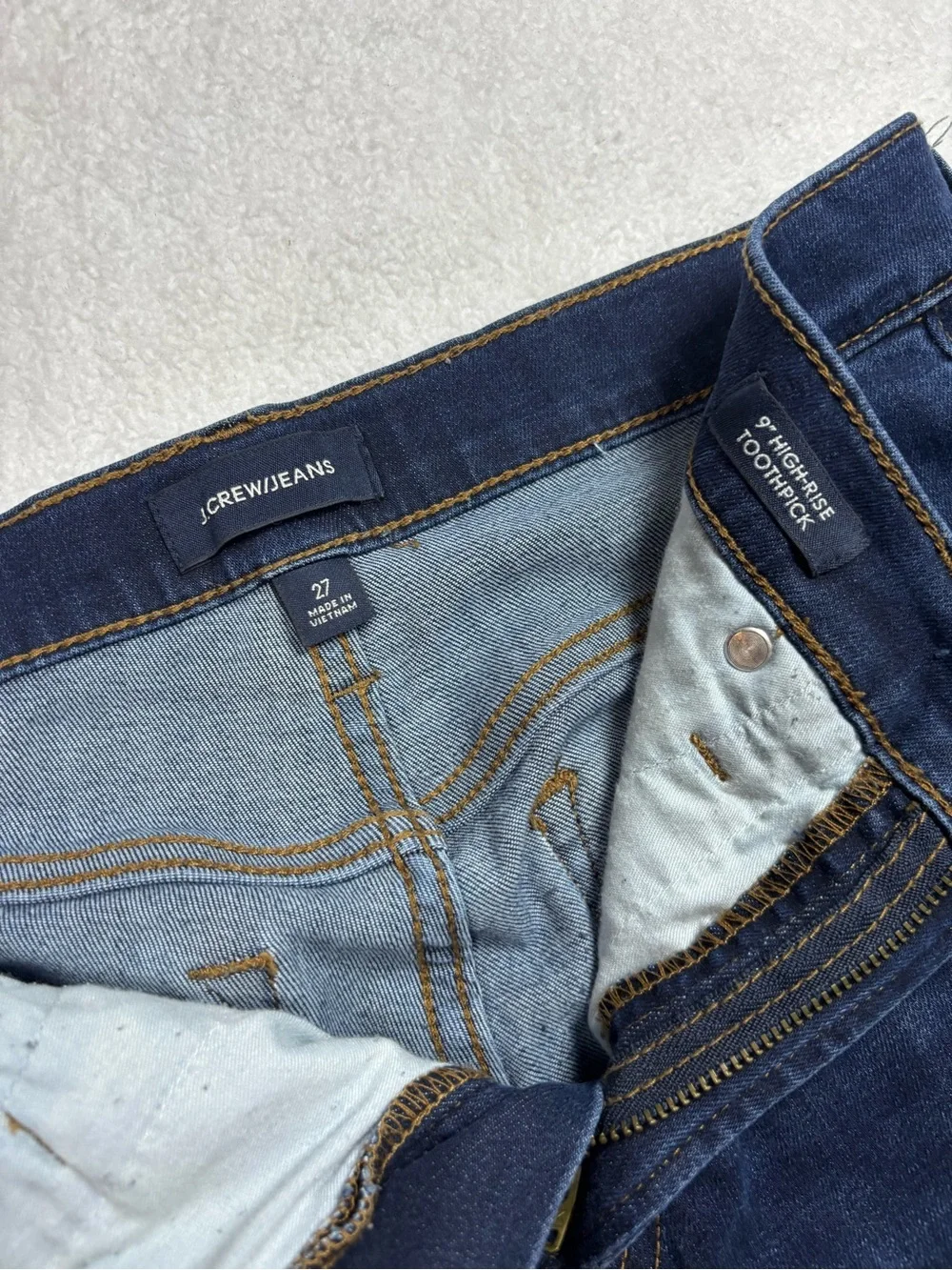 J.Crew jeans, Women’s high‑rise skinny size 27, dark wash, stretchy and sleek.